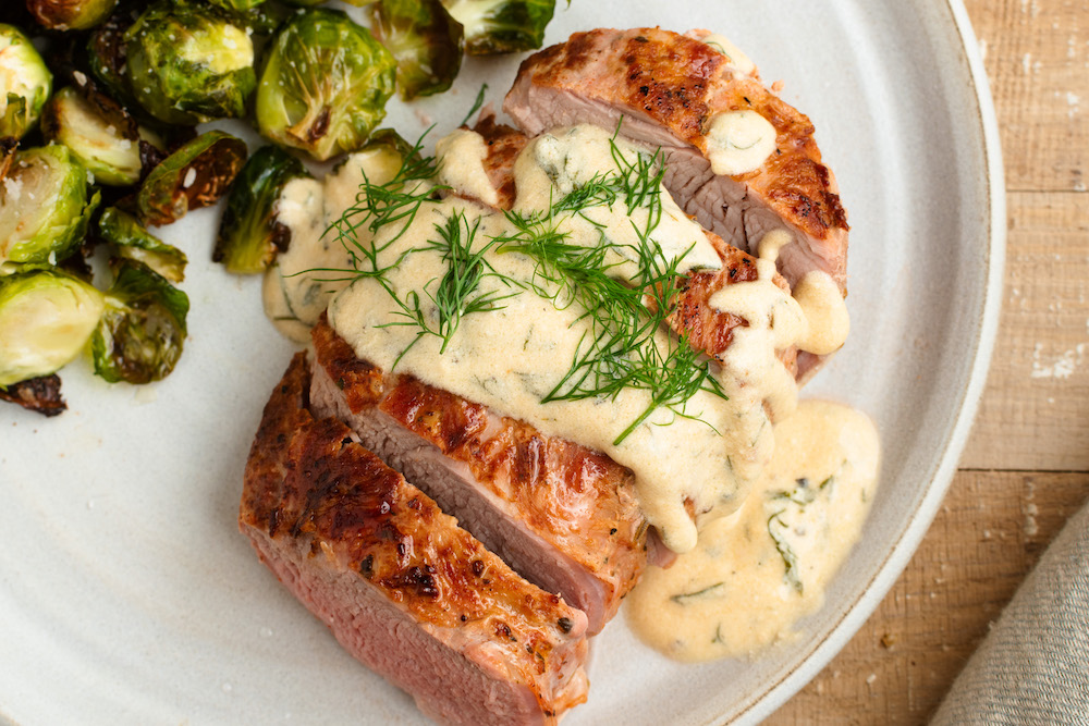 Pork tenderloin with creamy dill sauce - Strongr Fastr: AI Nutrition, Workouts, and Meal Planner