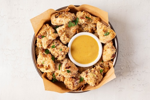 Caveman chicken nuggets with honey mustard