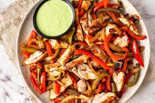Chicken fajitas with cilantro crema